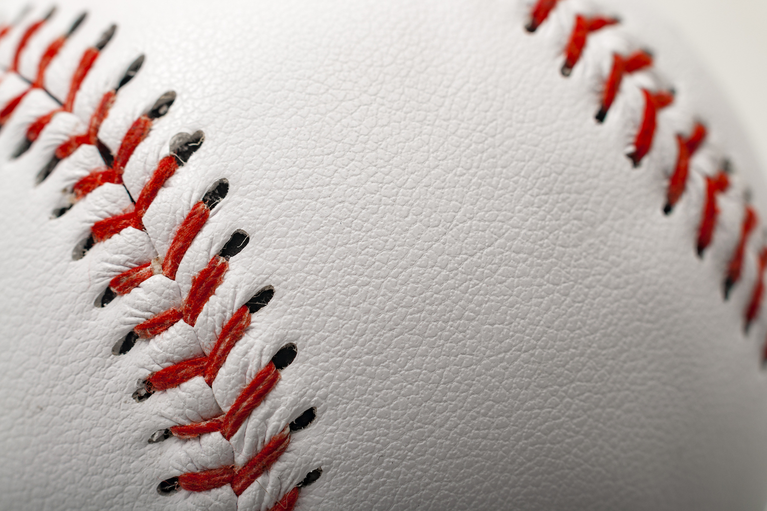 Baseball with the focus on the stitches with copyspace Baseball Armored Heat App Subscription